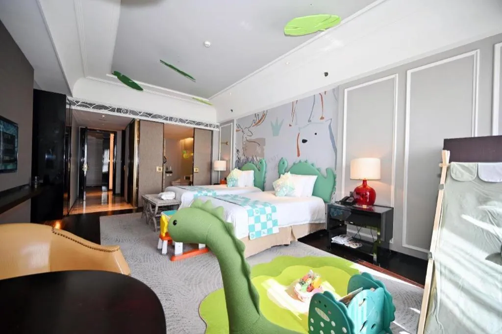 Bed in Grand New Century Hotel Yixing