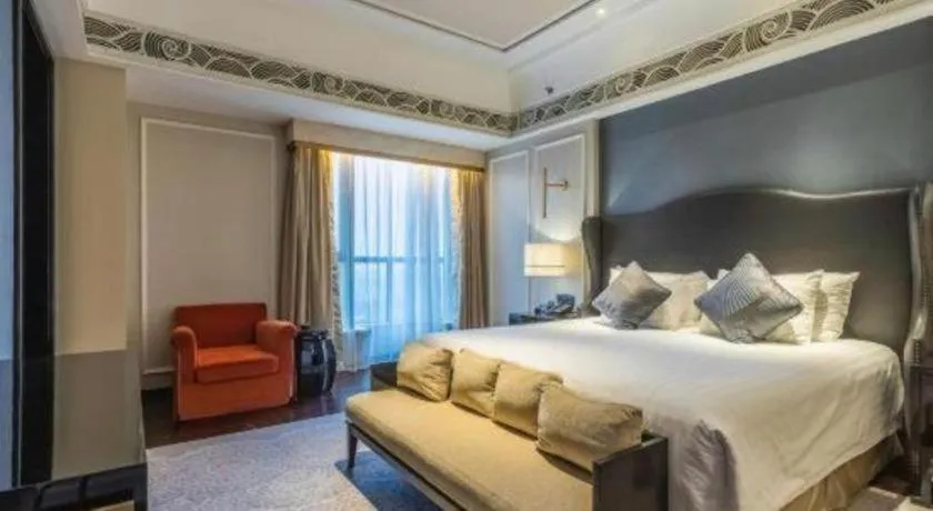 Bed in Grand New Century Hotel Yixing