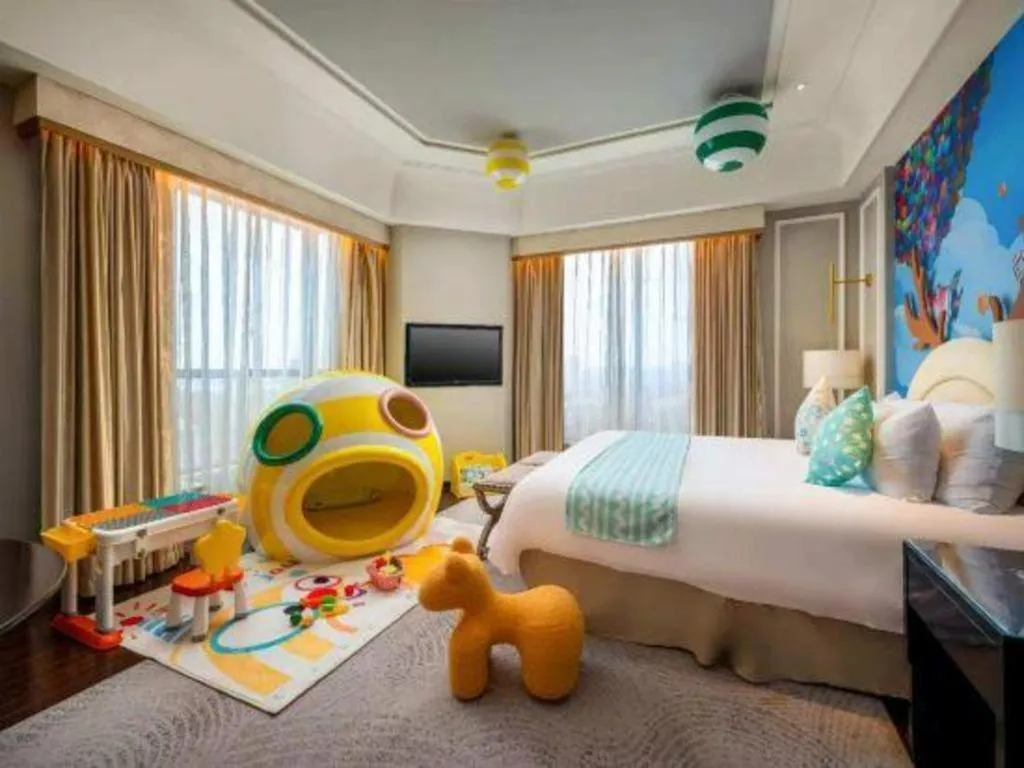 Bed in Grand New Century Hotel Yixing