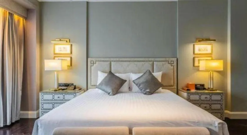Bed in Grand New Century Hotel Yixing