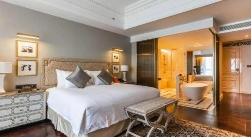 Bed in Grand New Century Hotel Yixing
