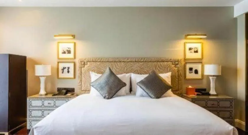 Bed in Grand New Century Hotel Yixing