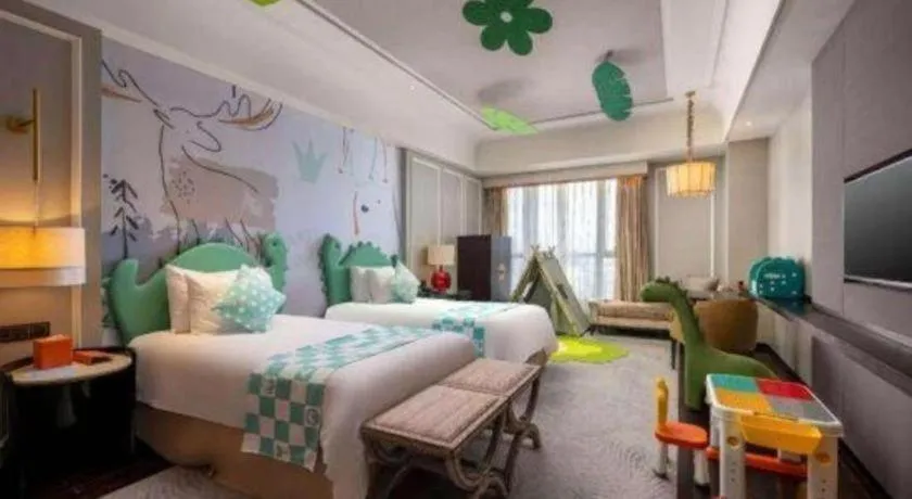 Bed in Grand New Century Hotel Yixing