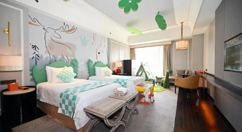 Bed in Grand New Century Hotel Yixing