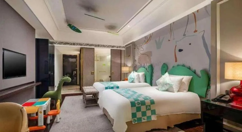 Bed in Grand New Century Hotel Yixing