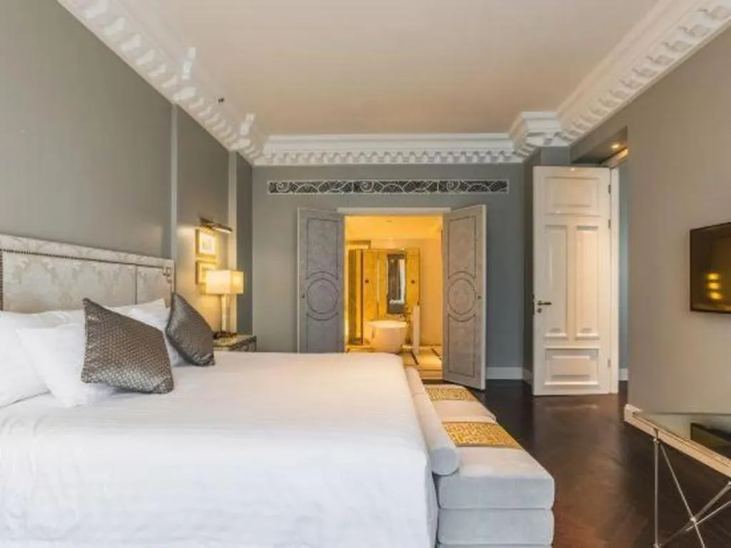 Bed in Grand New Century Hotel Yixing