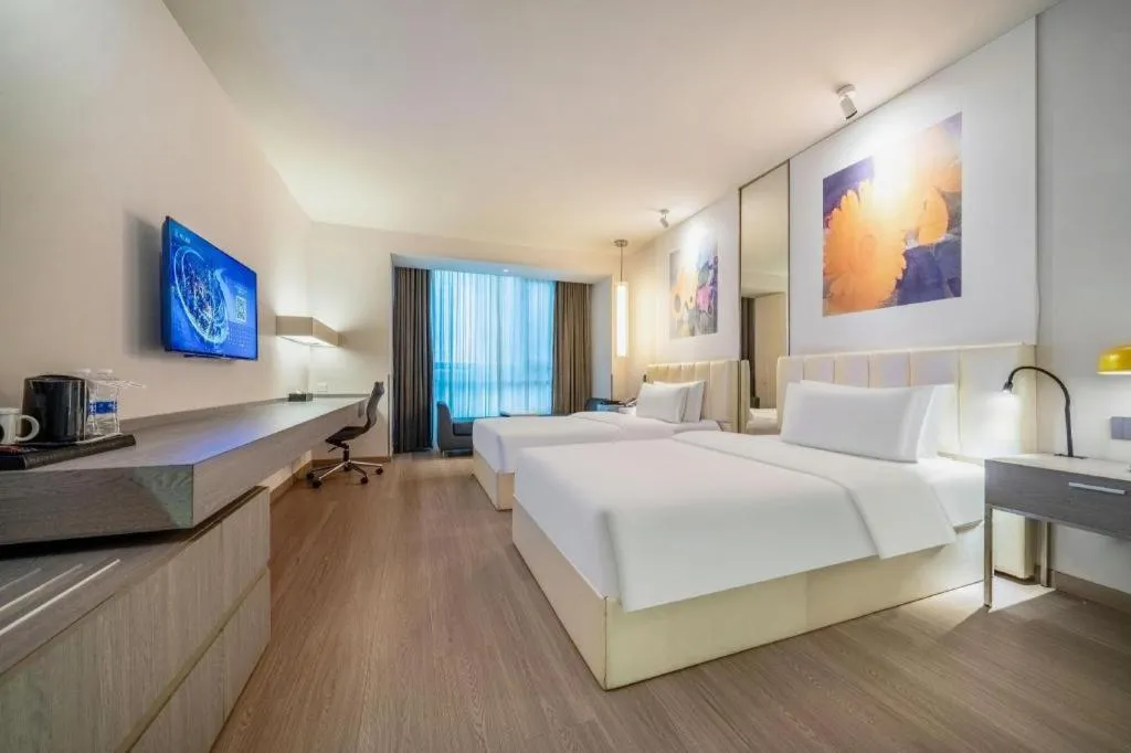 Bed in Jinjiang Metropolo Hotel Hangzhou Xiasha Jinsha Lake