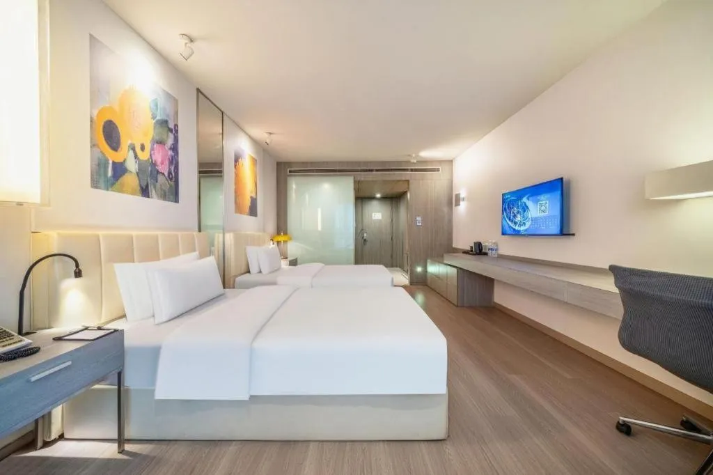 Bed in Jinjiang Metropolo Hotel Hangzhou Xiasha Jinsha Lake