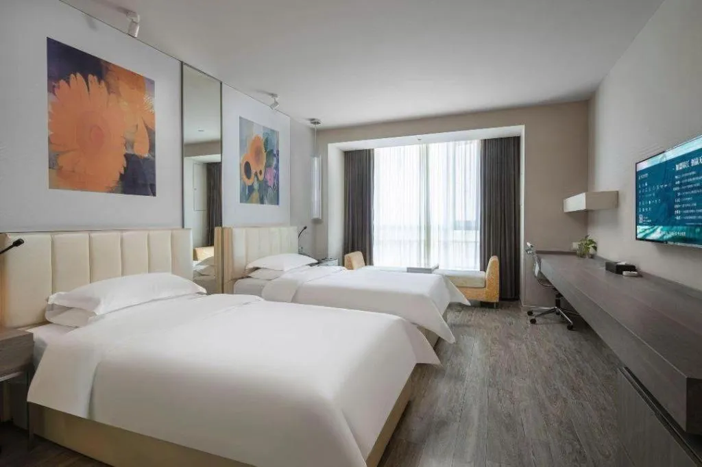 Bed in Jinjiang Metropolo Hotel Hangzhou Xiasha Jinsha Lake