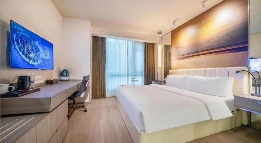 Bed in Jinjiang Metropolo Hotel Hangzhou Xiasha Jinsha Lake