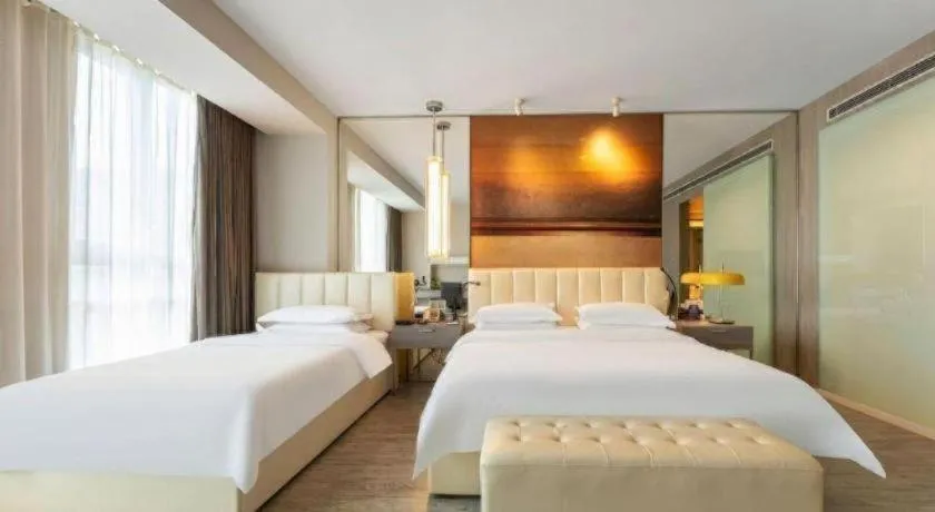 Bed in Jinjiang Metropolo Hotel Hangzhou Xiasha Jinsha Lake