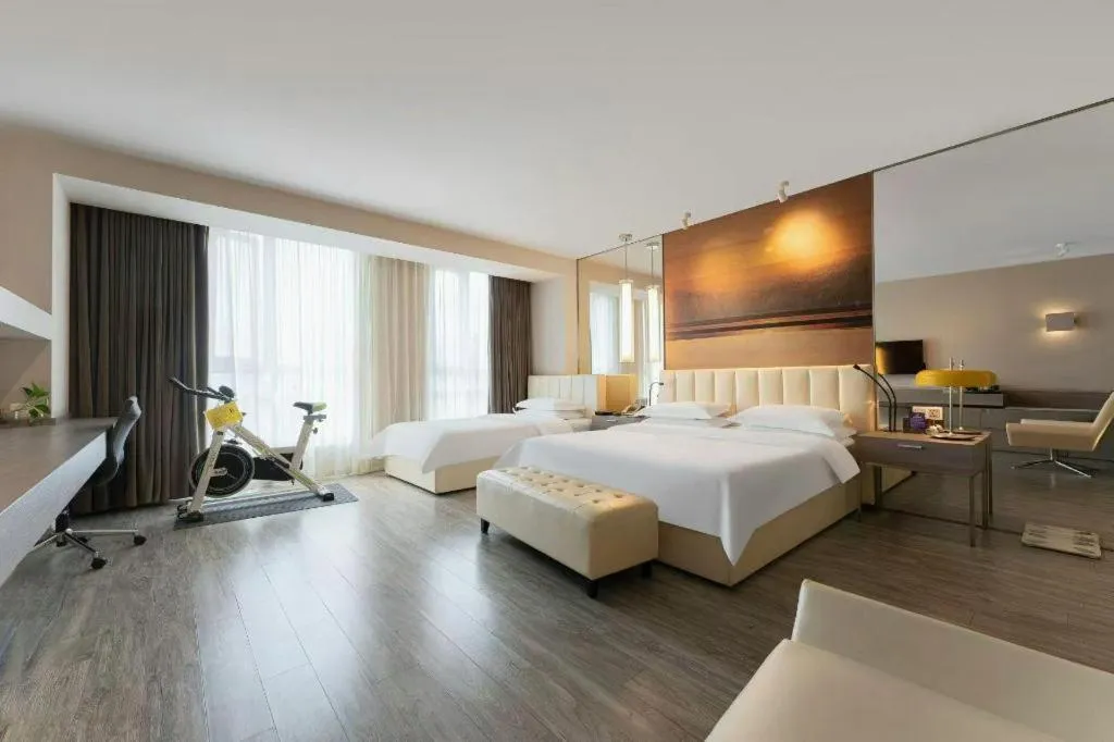 Bed in Jinjiang Metropolo Hotel Hangzhou Xiasha Jinsha Lake