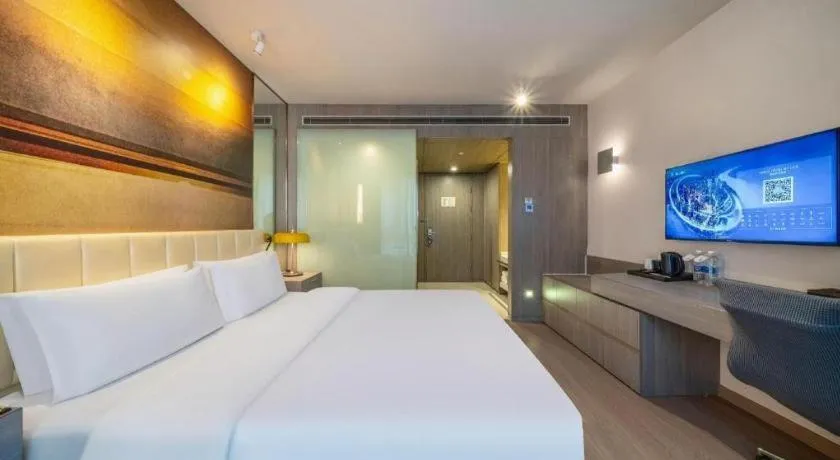 Bed in Jinjiang Metropolo Hotel Hangzhou Xiasha Jinsha Lake