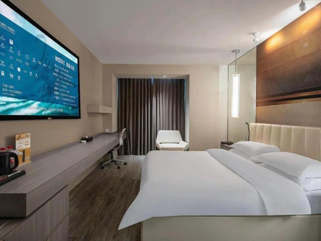 Bed in Jinjiang Metropolo Hotel Hangzhou Xiasha Jinsha Lake