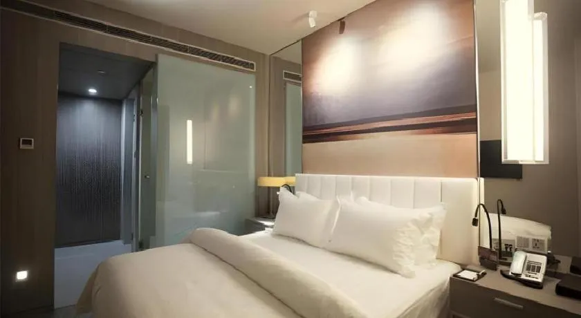 Bed in Jinjiang Metropolo Hotel Hangzhou Xiasha Jinsha Lake