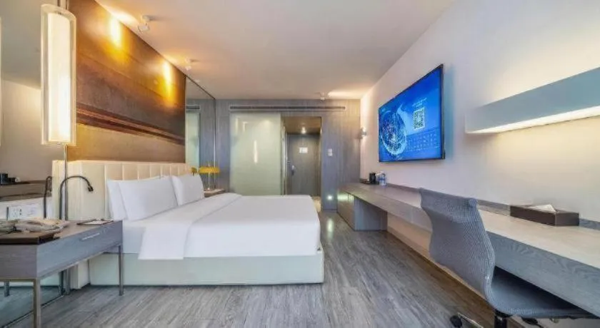 Bed in Jinjiang Metropolo Hotel Hangzhou Xiasha Jinsha Lake