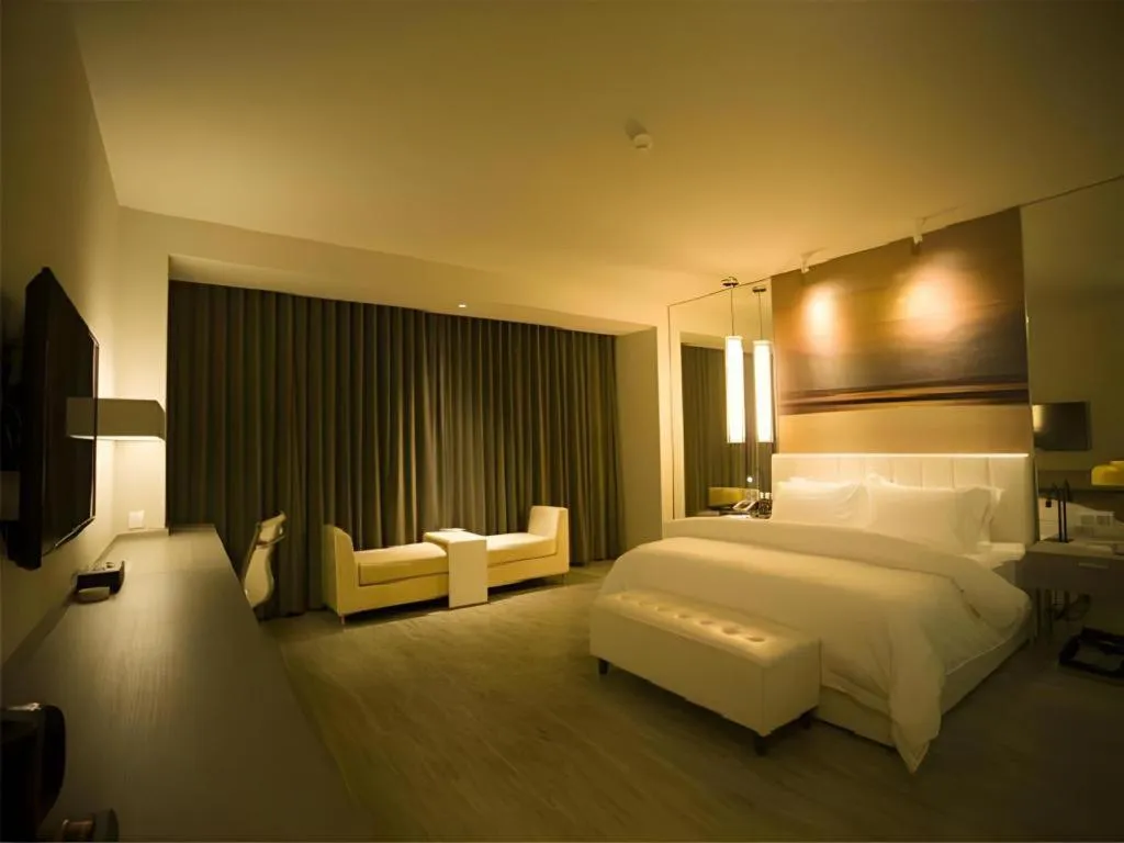 Bed in Jinjiang Metropolo Hotel Hangzhou Xiasha Jinsha Lake