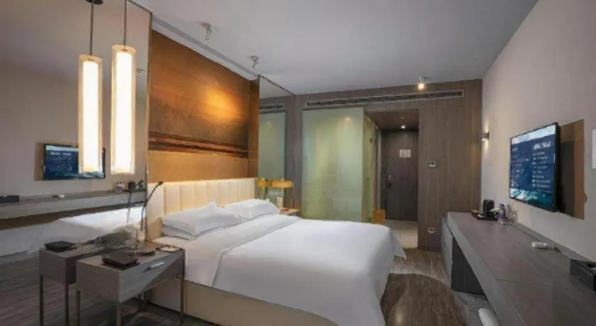 Bed in Jinjiang Metropolo Hotel Hangzhou Xiasha Jinsha Lake