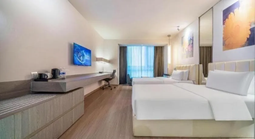 Bed in Jinjiang Metropolo Hotel Hangzhou Xiasha Jinsha Lake