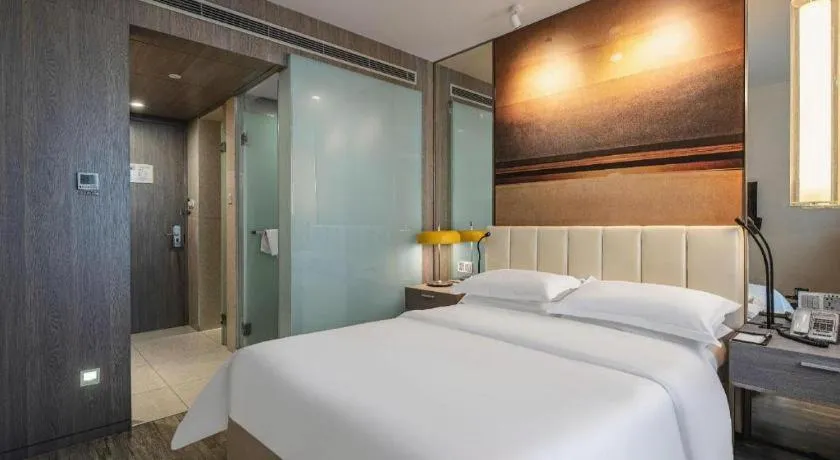 Bed in Jinjiang Metropolo Hotel Hangzhou Xiasha Jinsha Lake