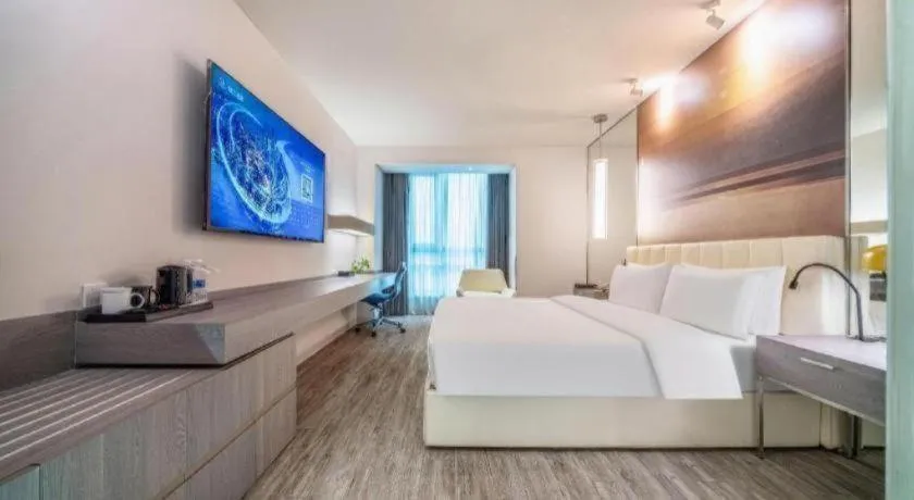 Bed in Jinjiang Metropolo Hotel Hangzhou Xiasha Jinsha Lake