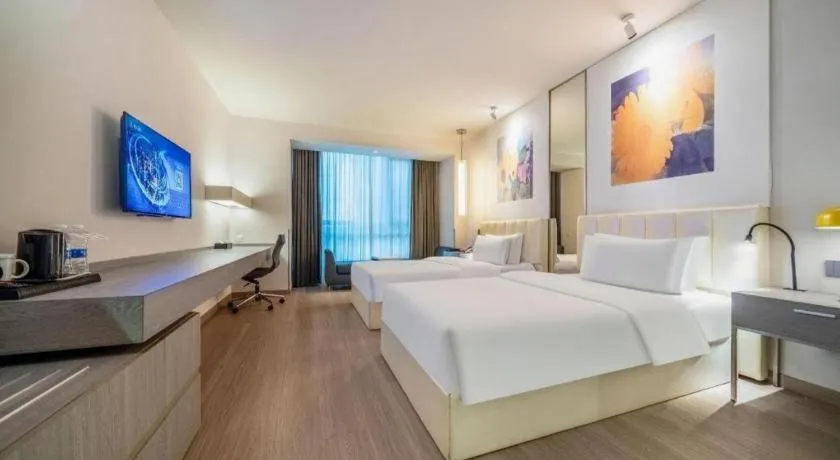 Bed in Jinjiang Metropolo Hotel Hangzhou Xiasha Jinsha Lake