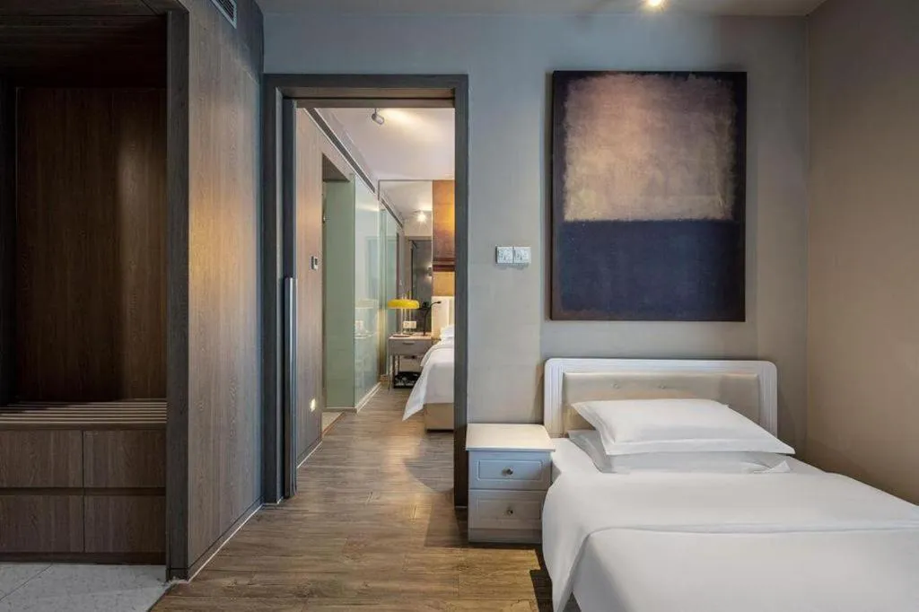 Bed in Jinjiang Metropolo Hotel Hangzhou Xiasha Jinsha Lake