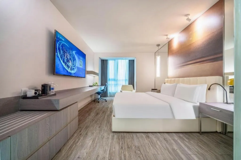 Bed in Jinjiang Metropolo Hotel Hangzhou Xiasha Jinsha Lake