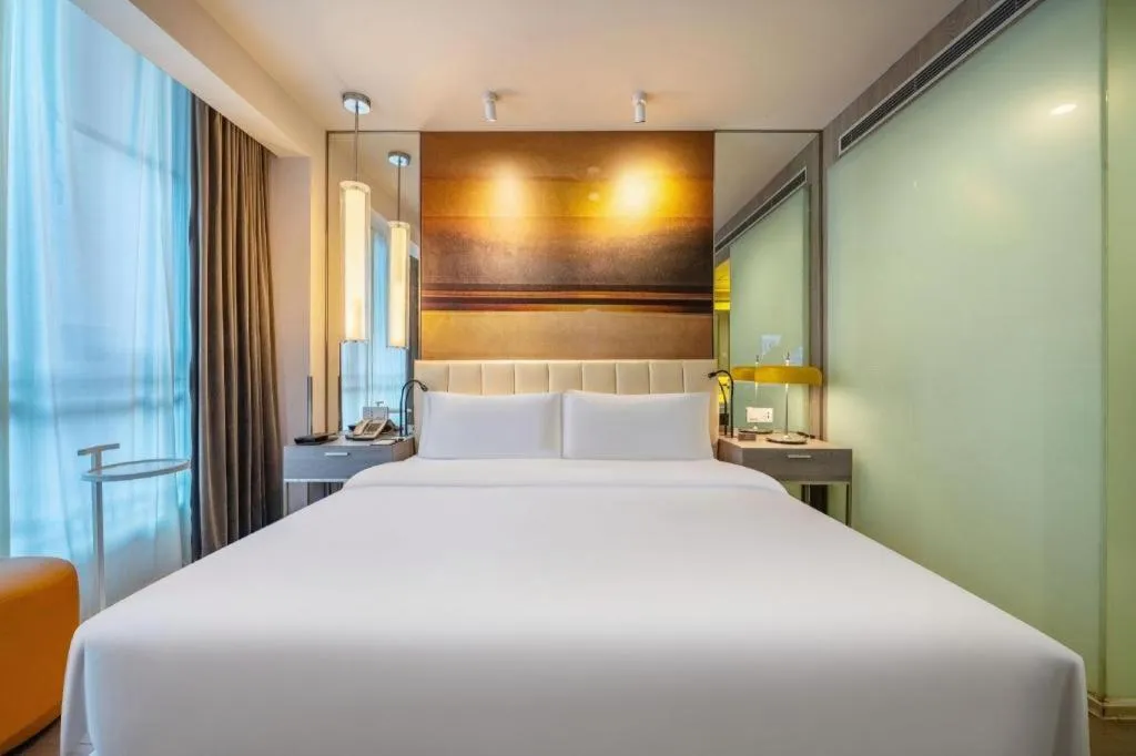 Bed in Jinjiang Metropolo Hotel Hangzhou Xiasha Jinsha Lake