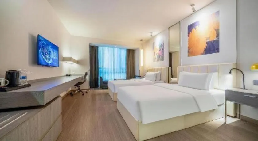 Bed in Jinjiang Metropolo Hotel Hangzhou Xiasha Jinsha Lake