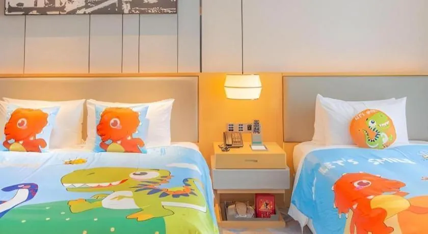 Bed in Zhuhai Tangyi Hotel