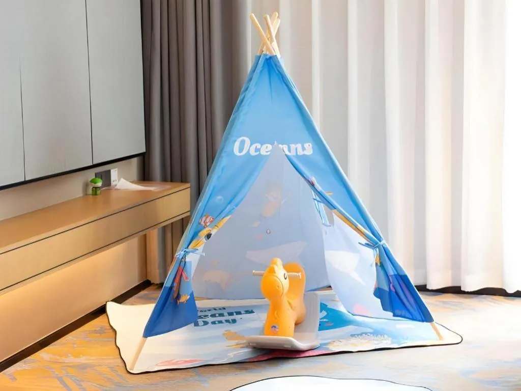 Bed in Zhuhai Tangyi Hotel