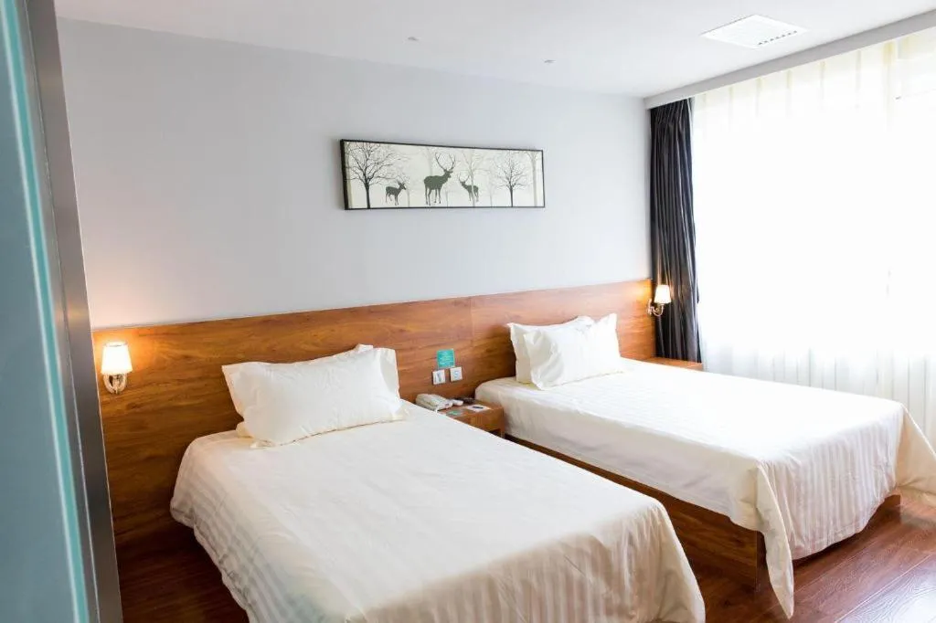 Bed in Jinjiang Inn Style Tianjin Wuqing Traditional Chinese Medical Hospital