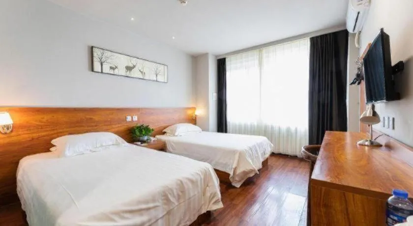 Bed in Jinjiang Inn Style Tianjin Wuqing Traditional Chinese Medical Hospital