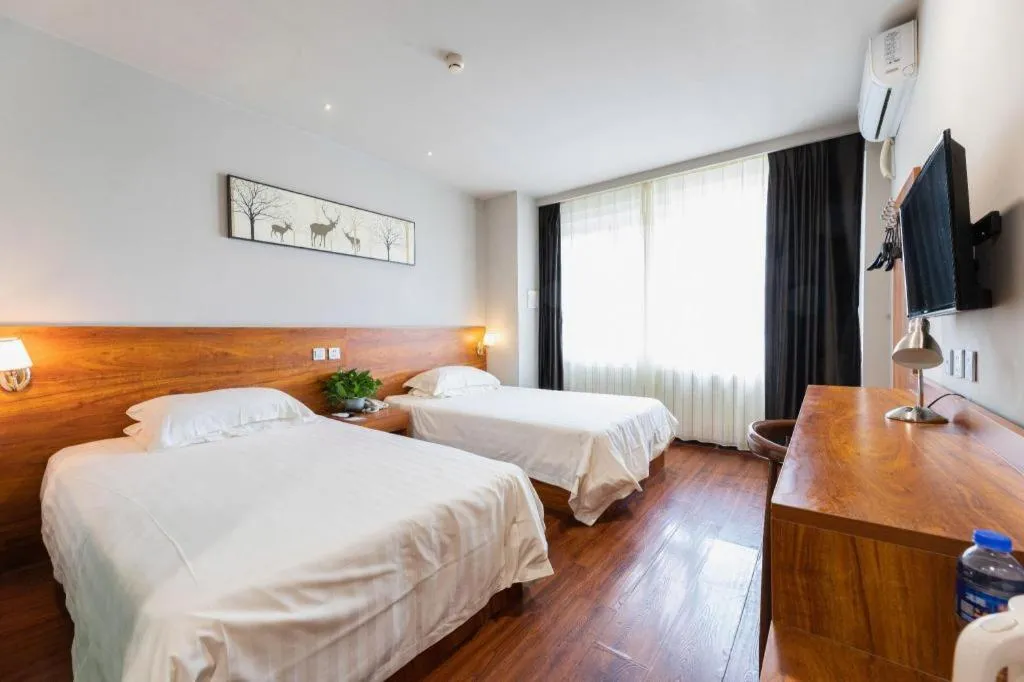 Bed in Jinjiang Inn Style Tianjin Wuqing Traditional Chinese Medical Hospital
