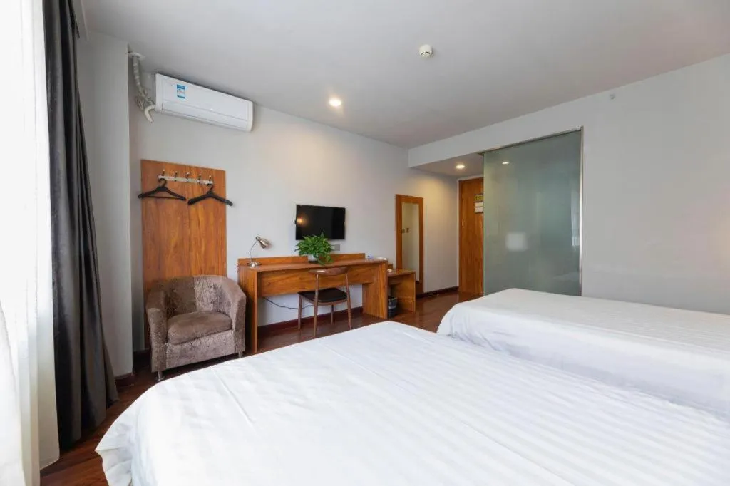 Bed in Jinjiang Inn Style Tianjin Wuqing Traditional Chinese Medical Hospital