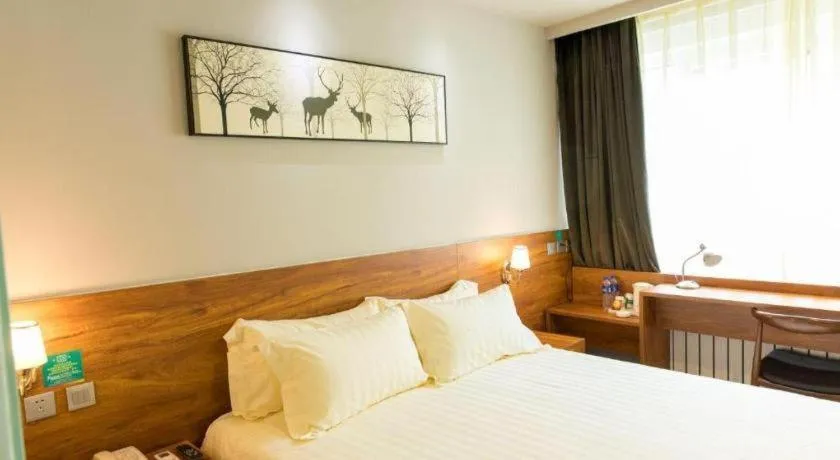 Bed in Jinjiang Inn Style Tianjin Wuqing Traditional Chinese Medical Hospital