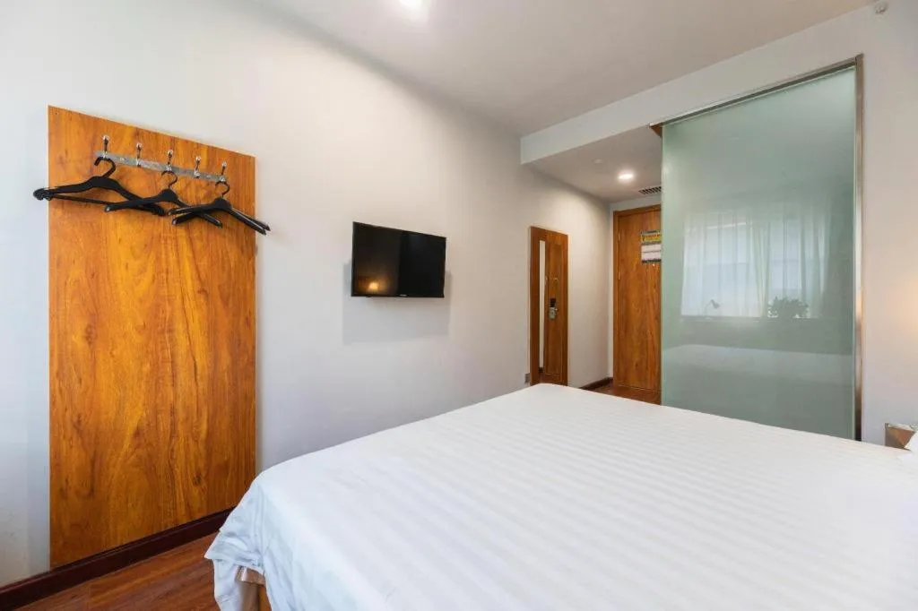 Bed in Jinjiang Inn Style Tianjin Wuqing Traditional Chinese Medical Hospital