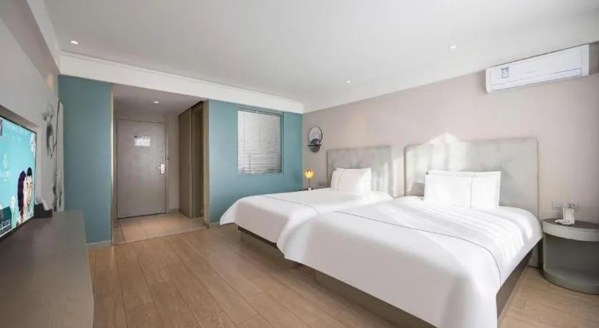 Bed in Magnotel Harbin Medical University First Affiliated Hospital