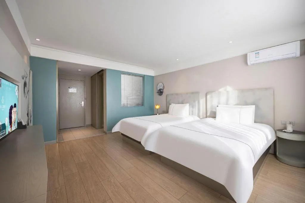 Bed in Magnotel Harbin Medical University First Affiliated Hospital