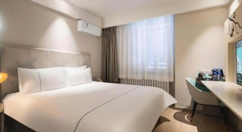 Bed in Magnotel Harbin Medical University First Affiliated Hospital