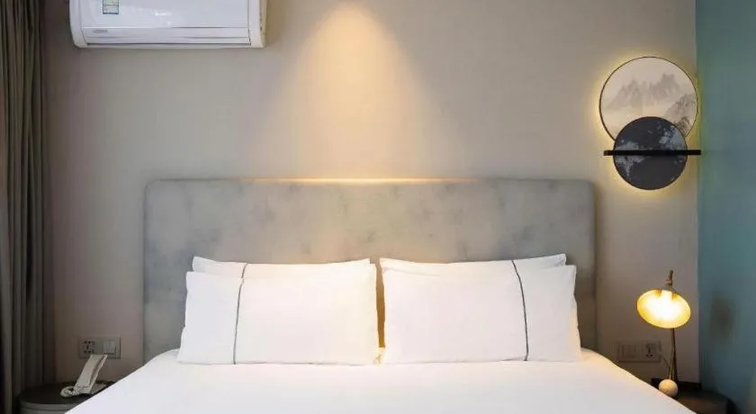 Bed in Magnotel Harbin Medical University First Affiliated Hospital