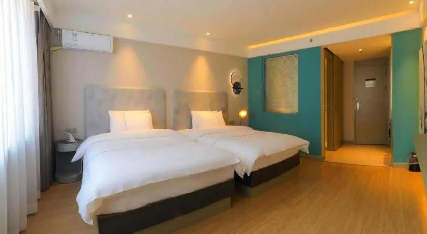 Bed in Magnotel Harbin Medical University First Affiliated Hospital