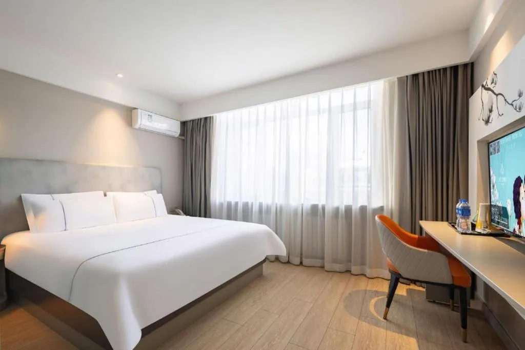 Bed in Magnotel Harbin Medical University First Affiliated Hospital