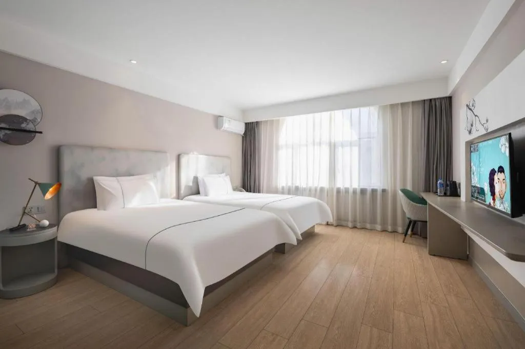 Bed in Magnotel Harbin Medical University First Affiliated Hospital