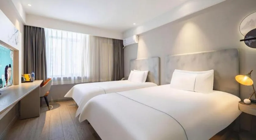 Bed in Magnotel Harbin Medical University First Affiliated Hospital