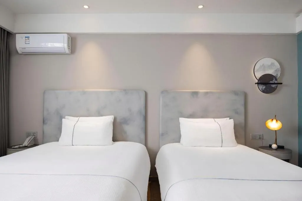 Bed in Magnotel Harbin Medical University First Affiliated Hospital