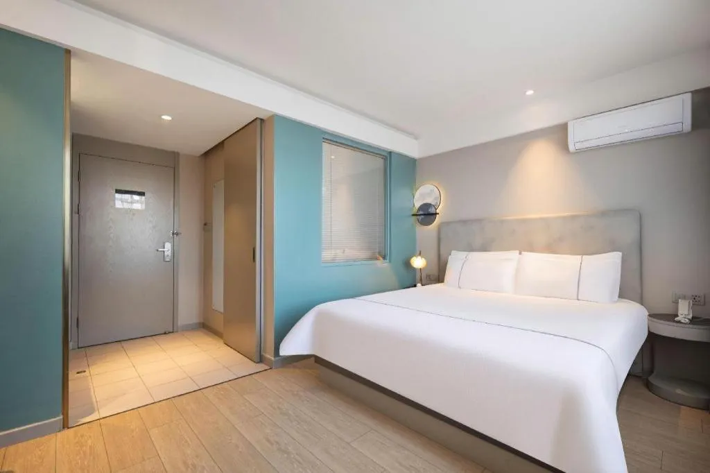 Bed in Magnotel Harbin Medical University First Affiliated Hospital