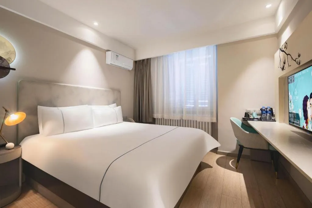 Bed in Magnotel Harbin Medical University First Affiliated Hospital