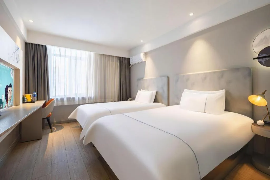 Bed in Magnotel Harbin Medical University First Affiliated Hospital